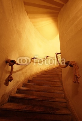 Old staircase in a tight corridor