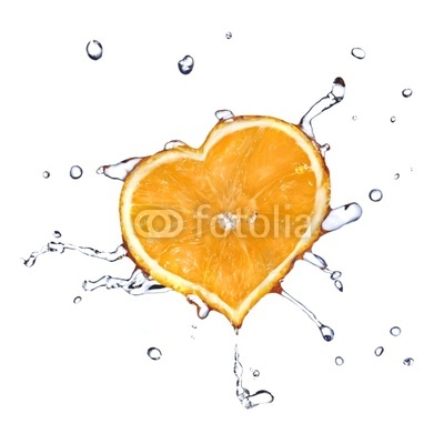 water drops on heart from orange isolated on white