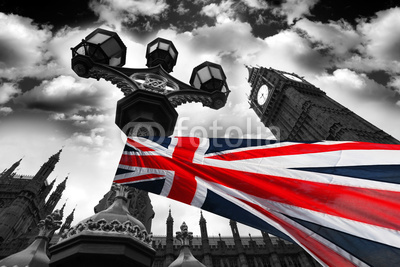 Big Ben with colorful flag of England, London, UK
