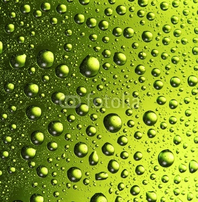 Texture of water drops on the bottle of beer.