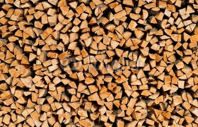 Holzstapel im Sonnenlicht - Background Image