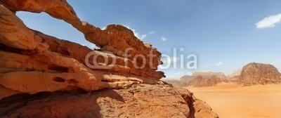 rock bridge and panoramic view of Wadi Rum desert, Jordan