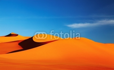 Sand dune in Sahara Desert at sunset