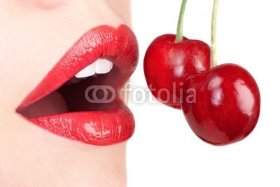 sexy red lips with cherry isolated on white