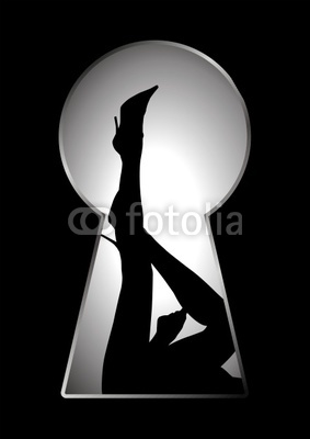 Silhouette of legs of a woman seen through a key hole