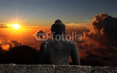Buddha watching sunset