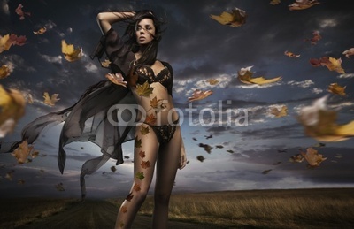 Fine art photo of a beauty lady in the autumn scenery