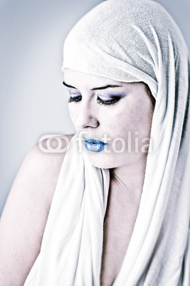 Portrait of a beautiful arabian girl wearing white cloth.