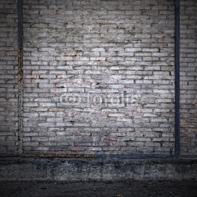 Old brick wall in an abandoned factory